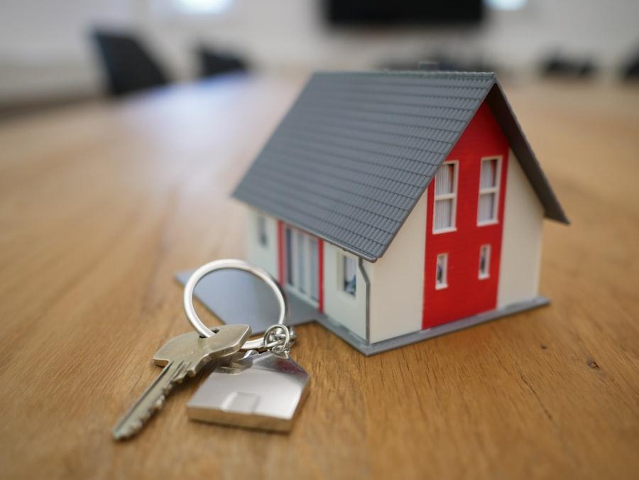 Keys handed over in front of a home